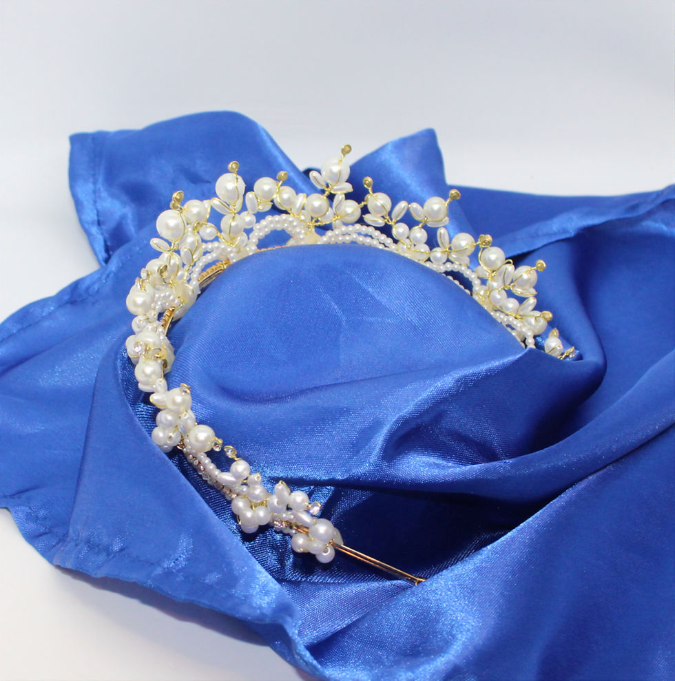 Thumbnail: Wedding tiara displayed with bridal hairstyle inspiration