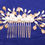 Thumbnail: bridal hair comb with white rice pearls, glass pearls amber rhinestones on a gold color wire base comb