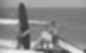 Teens gathered with their surfboards on the beach, 1966. Photo courtesy of the North Carolina Maritime Museum at Beaufort.