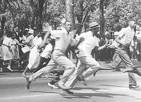 CHILDREN DEMONSTRATORS RUNNING.jpeg