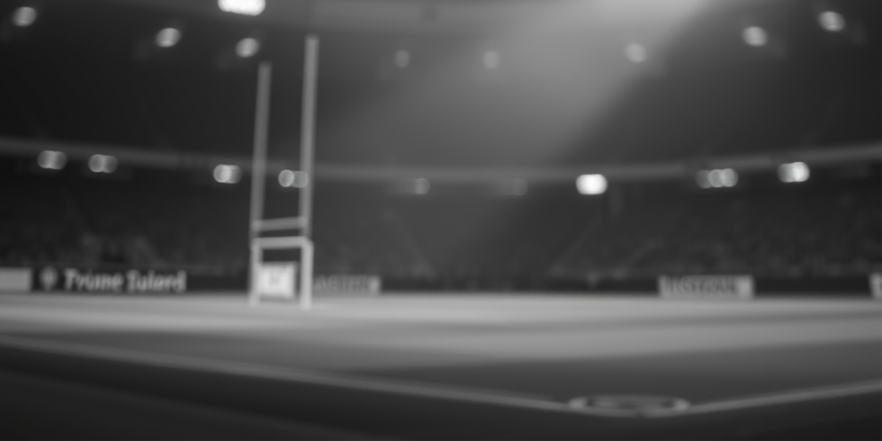 blurred black and white flood light rugby stadium - dramatic.png