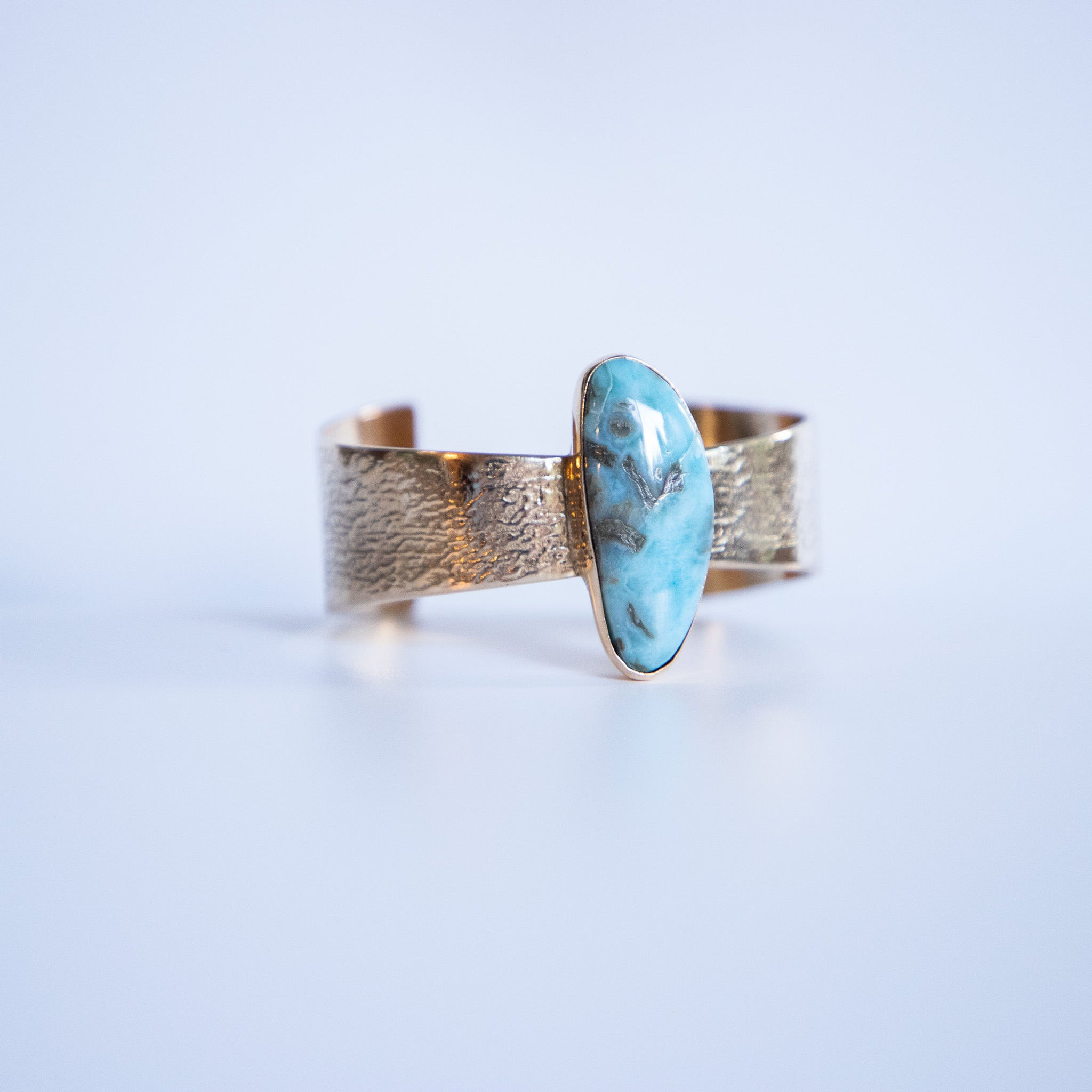 One-of-a-Kind Gold Bronze D-shaped Variegated Oval Stone Larimar Cuff