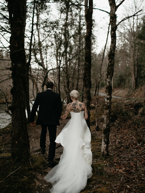 Smokey Mountain elopement photographer captures couple walking together to ceremony at Greenbrier