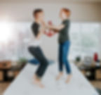 2 kids pretending to hit each other