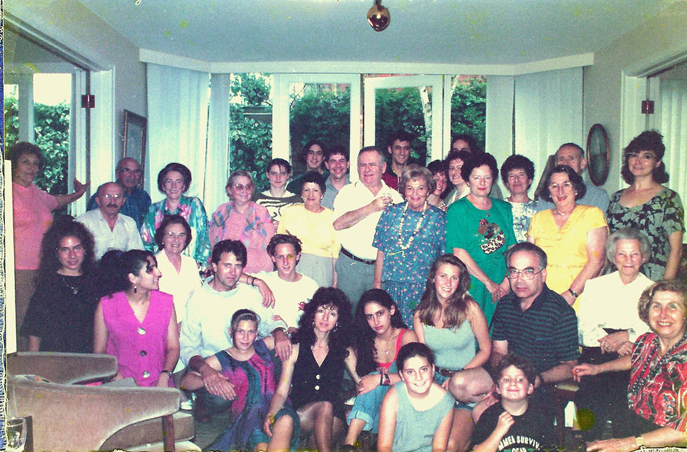 Family event at our home, 1994. From left: standing — Angie (Marysia's Italian helper), David Prince, Henry and Pola Bialkower, Ellen and Sharon Warren, Hela Warsztacki, Simon Schwarz, Leonard Warren, Sevek Warren, Henry Schwarz, Lisa Warren, Hedy Warren and Michael Hayman, Dorothy Broner, Marysia Rado, Rena Birner, Sigi Broner and Rose Schwarz; kneeling — Debbie Rado, Michelle Schwarz, Yvonne Wines (Graham's mother), Graham Wines, Anton Peleg, Koren Wines, Tom Rado, Helen Weinstein and Marysia Kohn; sitting — Jemma Wines, Celina Peleg, Justine Peleg and siblings Ilana and Jeremy Prince
