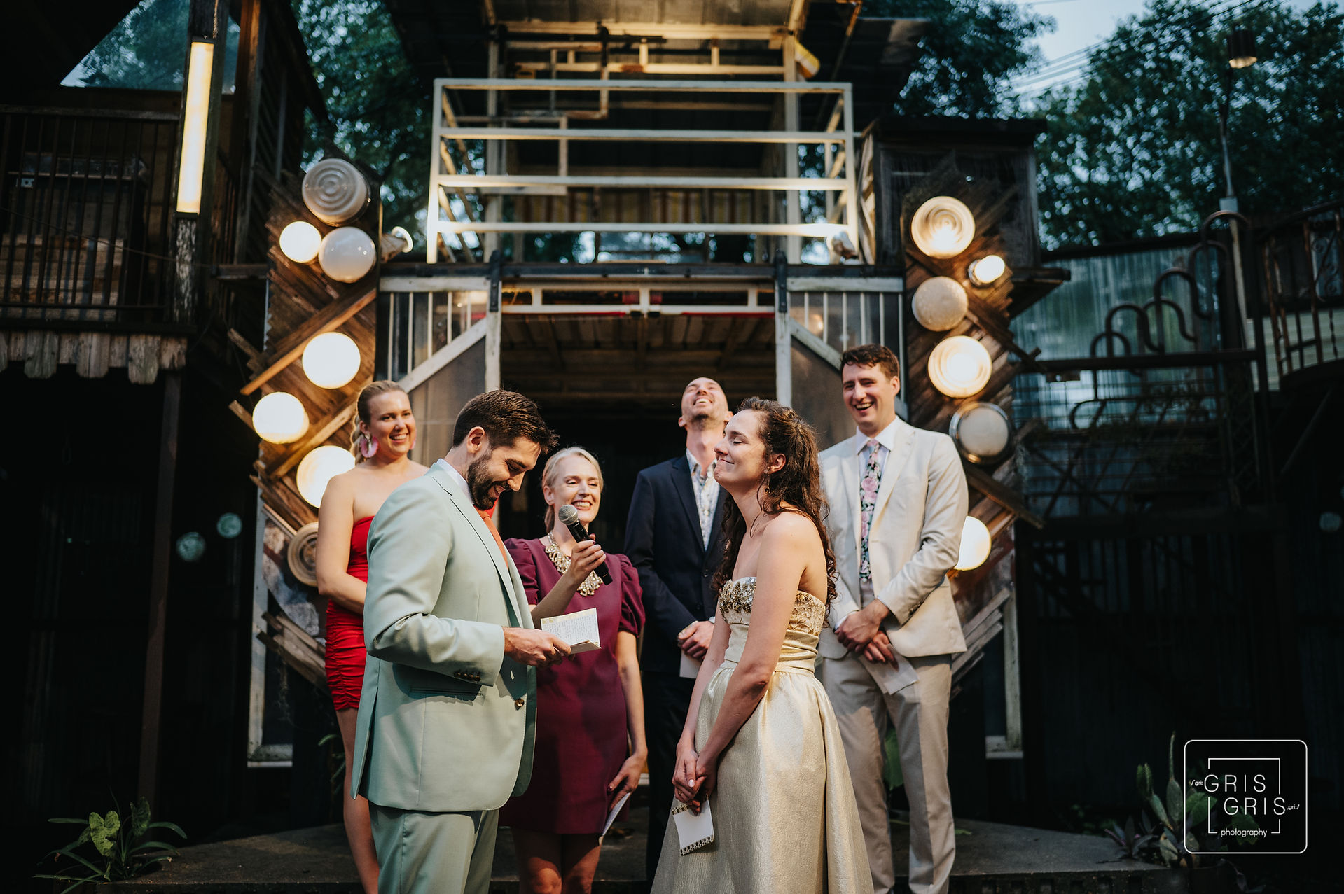 groom reading vows at music box 