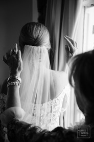 bride getting viel at park view hotel wedding prep