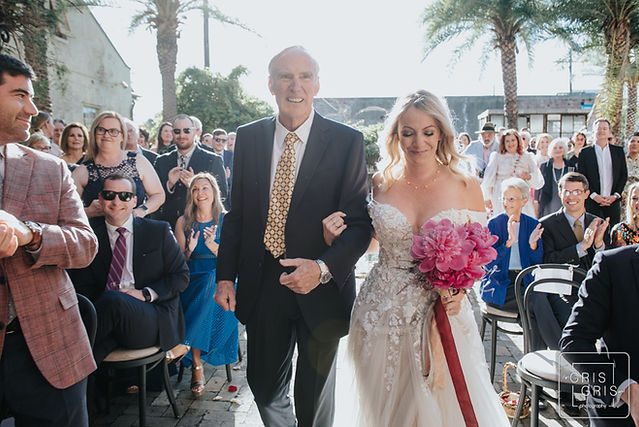 bride and her father walking down the aisle