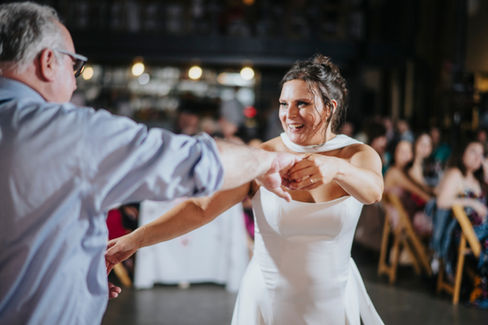 bride dancing with father