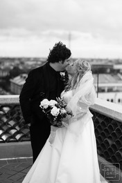 rooftop portrait of bride and groom at omni royal hotel