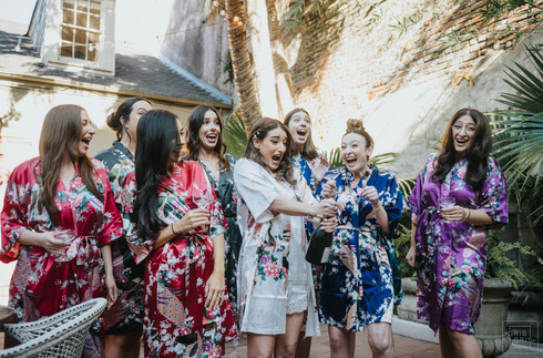 bride with bridesmaids and robes