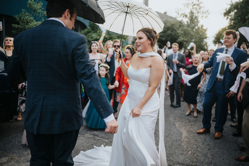 bride and groom dancing at secondline