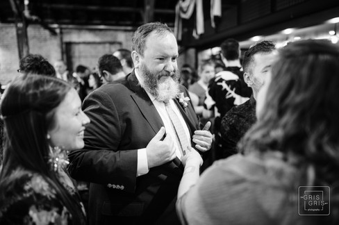 groom showing off tie at new orleans capulet wedding