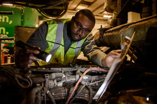 industrial photography photo of wastemanagement mechanic