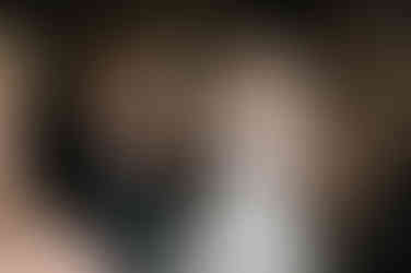 bride pitting on her veil