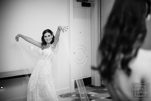 bride poses in dress