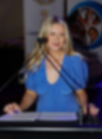 Michaela Cook / Micks on stage MC Emceeing Australia's Migrant Expo at Brisbane City Hall