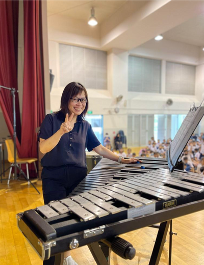 Ms Angeline Wee with a glockenspiel