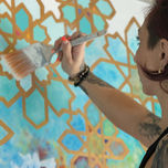 kala hagopian with flora and fauna mural 