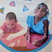 two school children colorful painted portraits