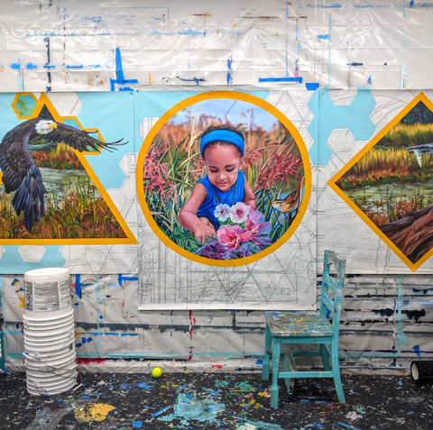 birds and portrait mural in progress in studio