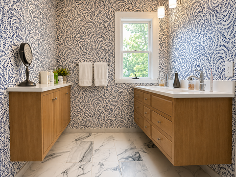 Marvin bathroom with custom floating white oak vanity and storage cabinet