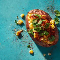 In summer, we picture Mediterranean flavors—charred corn, juicy tomatoes, feta, olives, and herbs—br