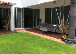 Jardín con área para bar