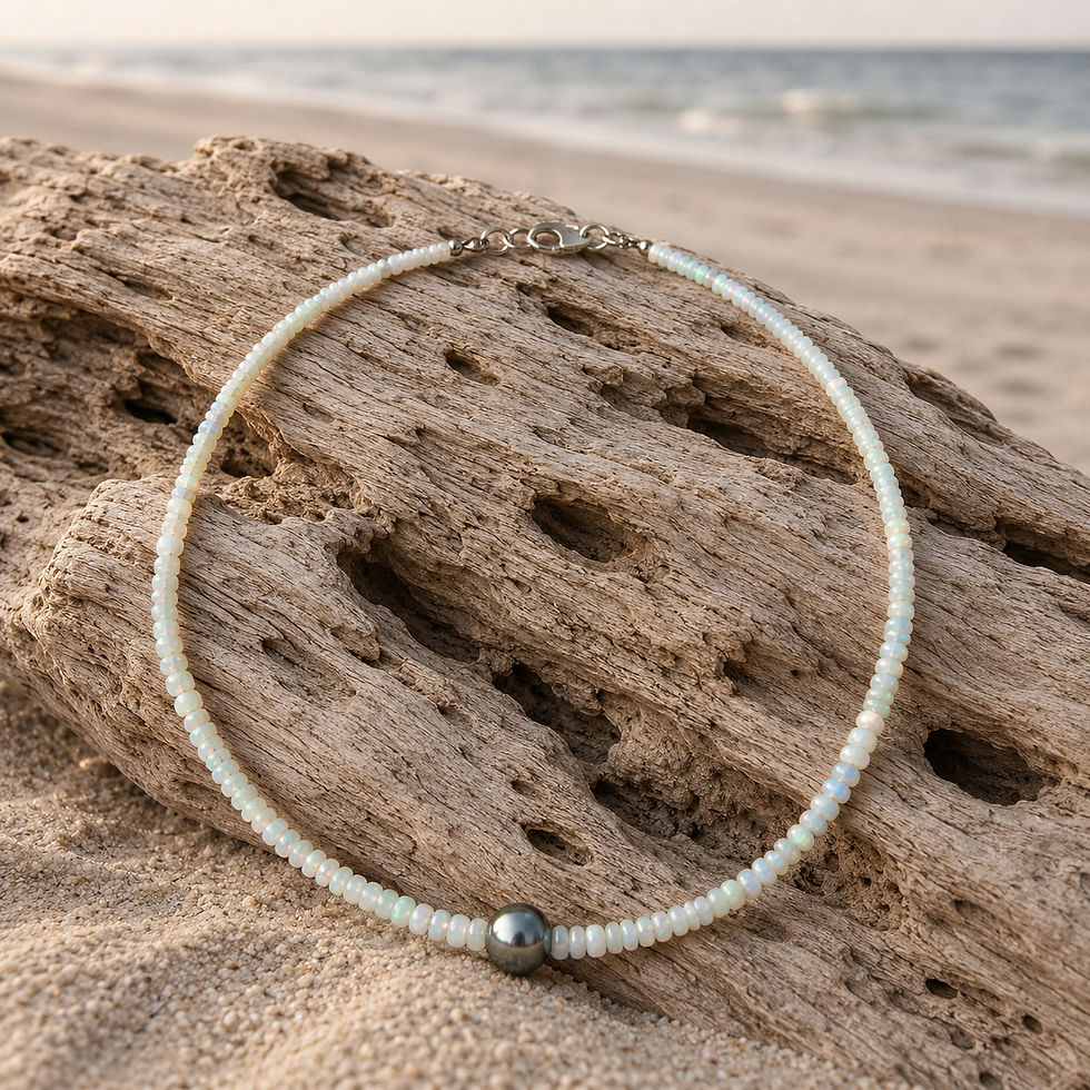 17-inch luxury necklace featuring White Ethiopian Opals and a 10mm Tahitian Pearl handcrafted by K. Tiffany Delano.