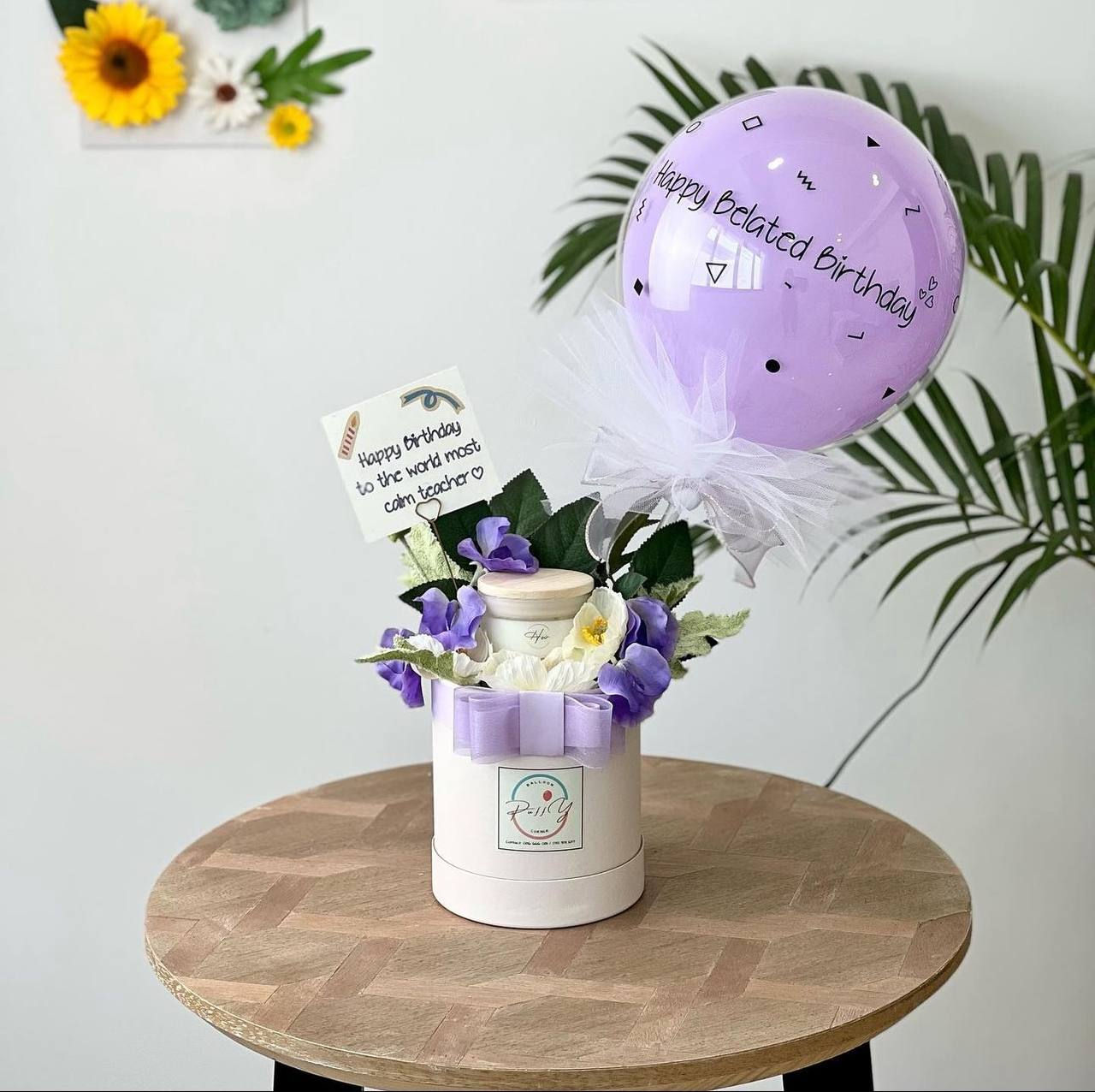 A FlowerBox with Balloon and Candle