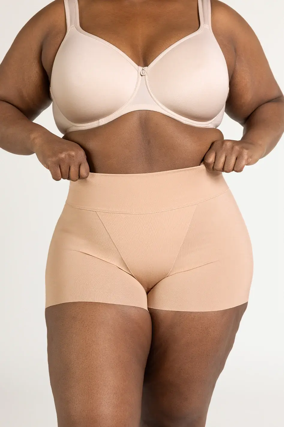 Understance Soft Support High-Rise Boyshorts on model in Champagne.