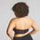 Thumbnail: Model wears Sculptresse Dana strapless bra, back view.