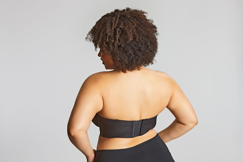 Thumbnail: Model wears Sculptresse Dana strapless bra, back view.
