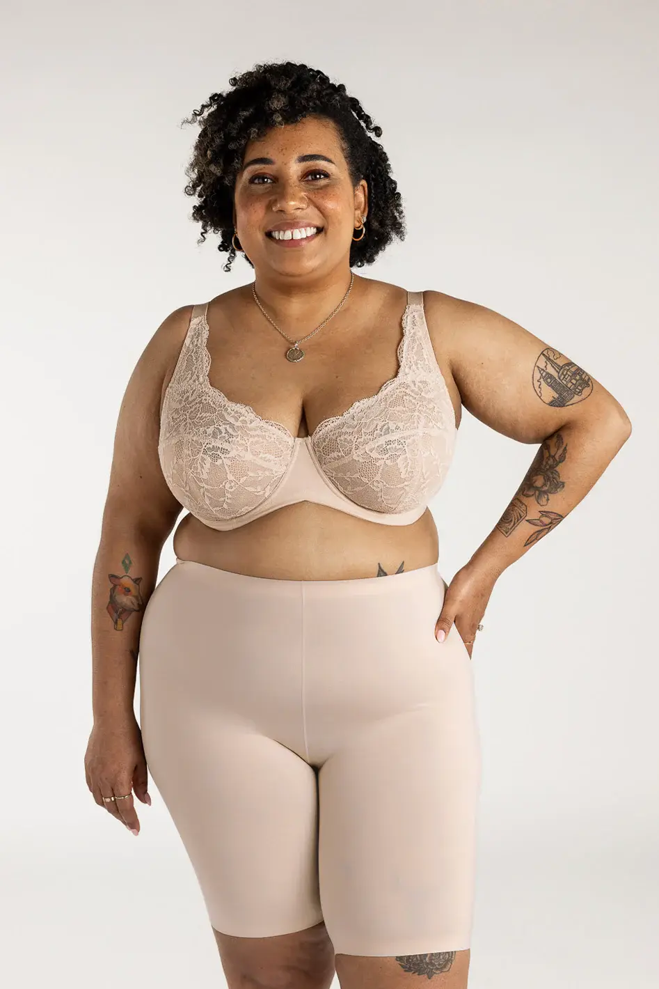 Thumbnail: Understance Soft Contour High-Rise Bike Shorts 7" on model, front view, champagne