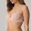 Thumbnail: Model wears Marie Jo Louie Full Cup Spacer bra while seated, side view.