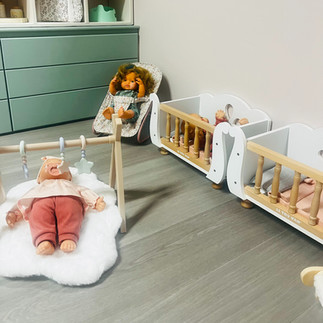 dolls, bouncers and cots in the new nursery role play area at petite street play village in south leicestershire