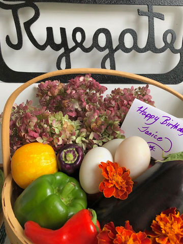 Fresh Organic Produce & Floral Gift Baskets