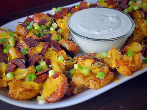 LOADED CRISPY POTATOES with Jalapeño Sour Cream