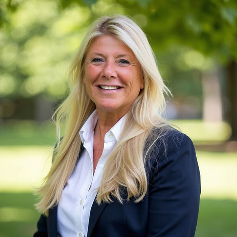 Hannelore navy blazer headshot.jpeg