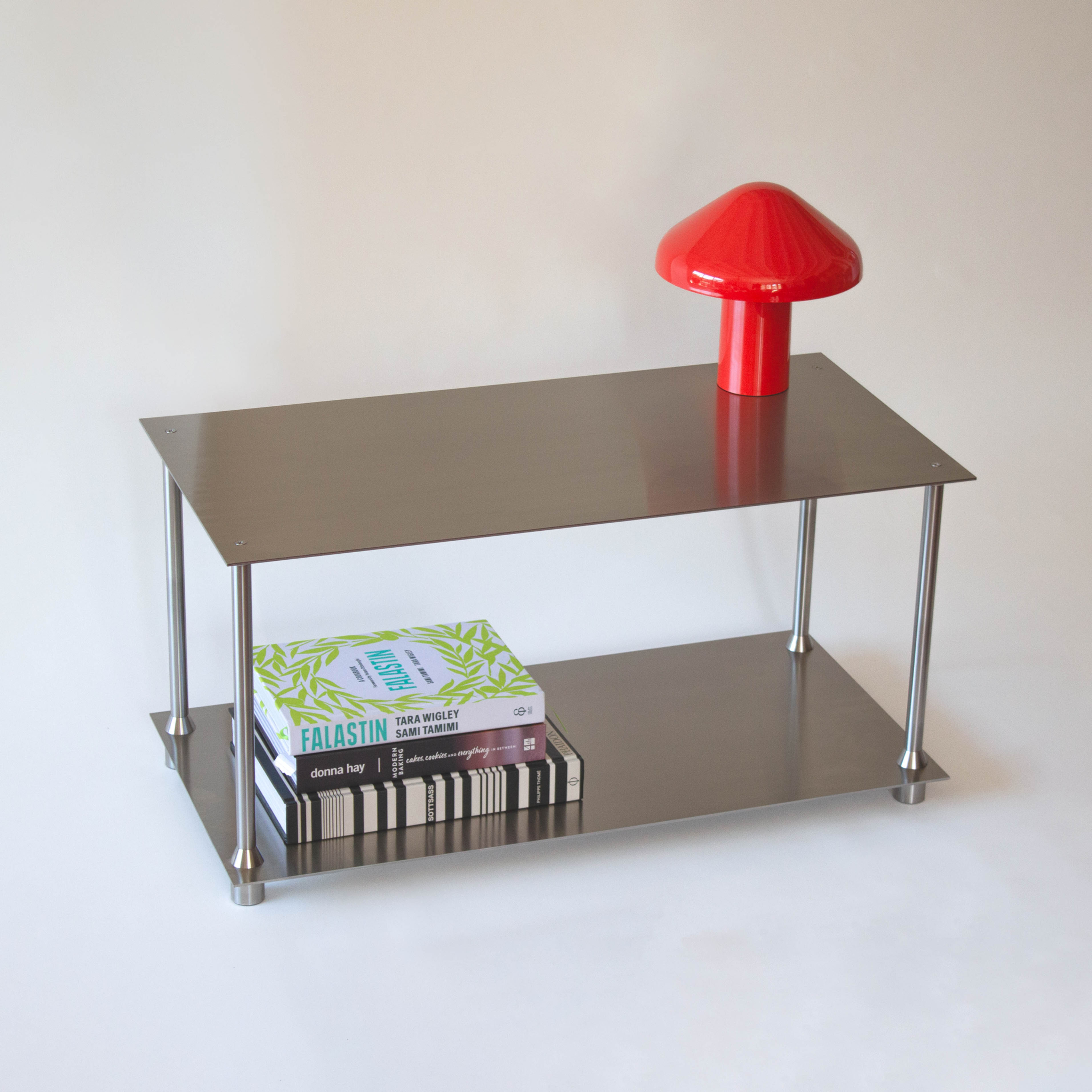 Cosmos Console Table – Stainless Steel, low 800 console styled with books & Hay Pao lamp, modern minimalist hallway furniture