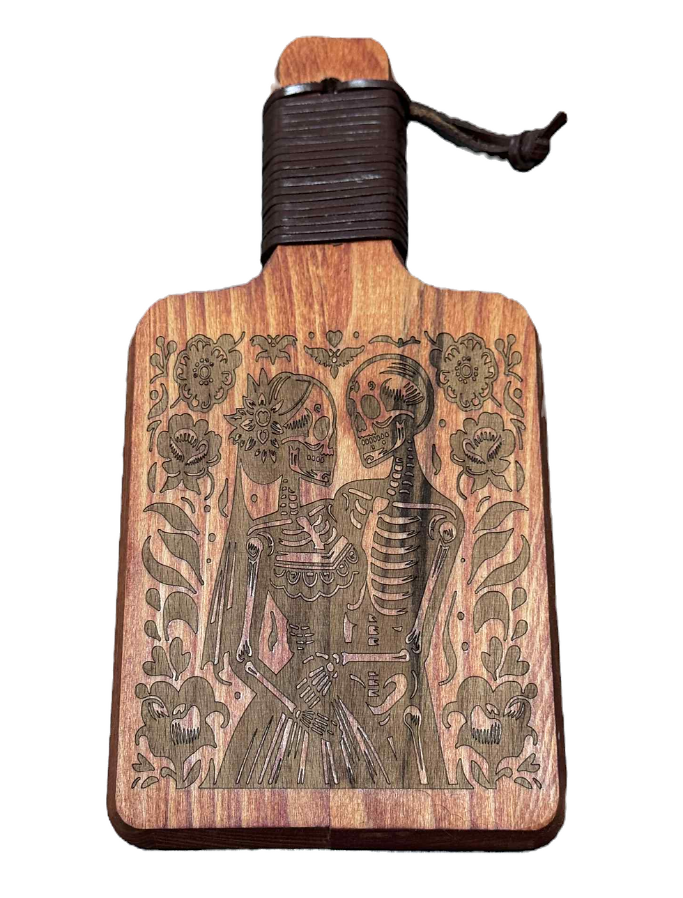Engraved wooden paddle: skeletons, floral design