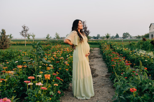 Caldwell Photo Session at Lovely Hollow farms. Family photography in flowers in Boise Idaho.