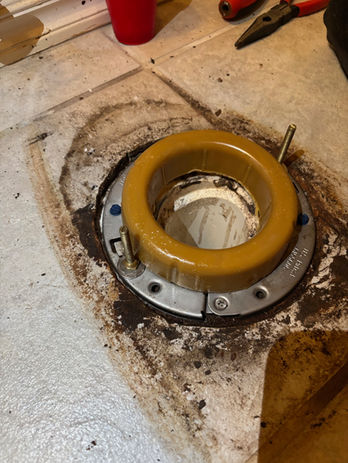 New toilet flange repair ring, mounting bolts and wax seal installed by Karney Plumbing in Broken Arrow.