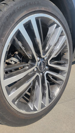 Close-up of a multi-spoke alloy car wheel rim