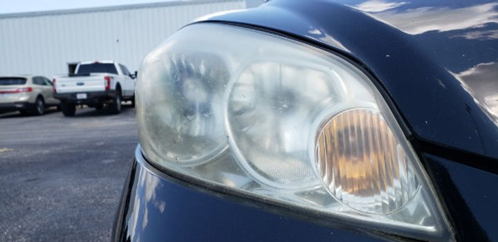 Headlight restoration before.jpeg
