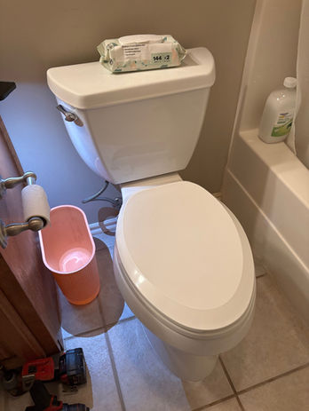 Toilet at Karney Plumbing’s Broken Arrow toilet flange repair project.