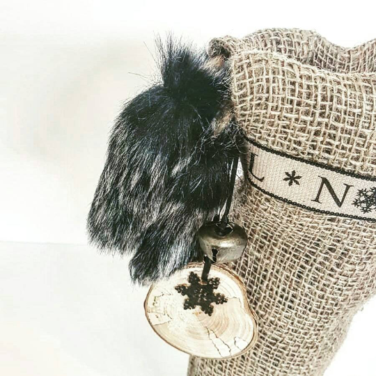 Thumbnail: A gorgeous pair of Black and Cream Noel Bottle Bag