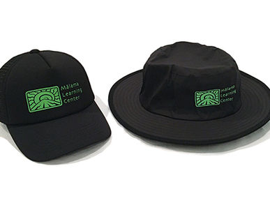 Custom Bucket Hats and Trucker Hats for Malama Learning Center.