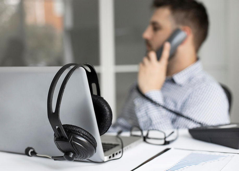 businessman-talking-phone_23-2148738319.jpg