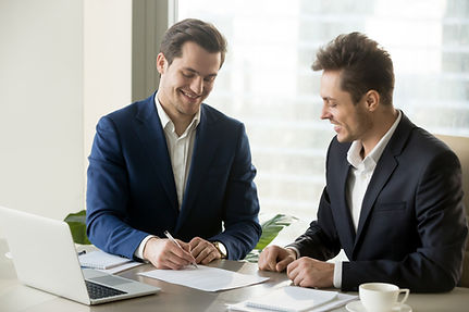 handsome-businessman-signing-contract-with-partner_1163-5281.jpg